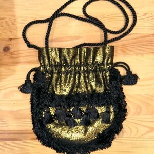 Kisa by Tamami Black and Gold Drawstring Crossbody Bag